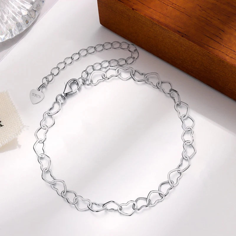 Sterling Silver Symbolic Charm Bracelet